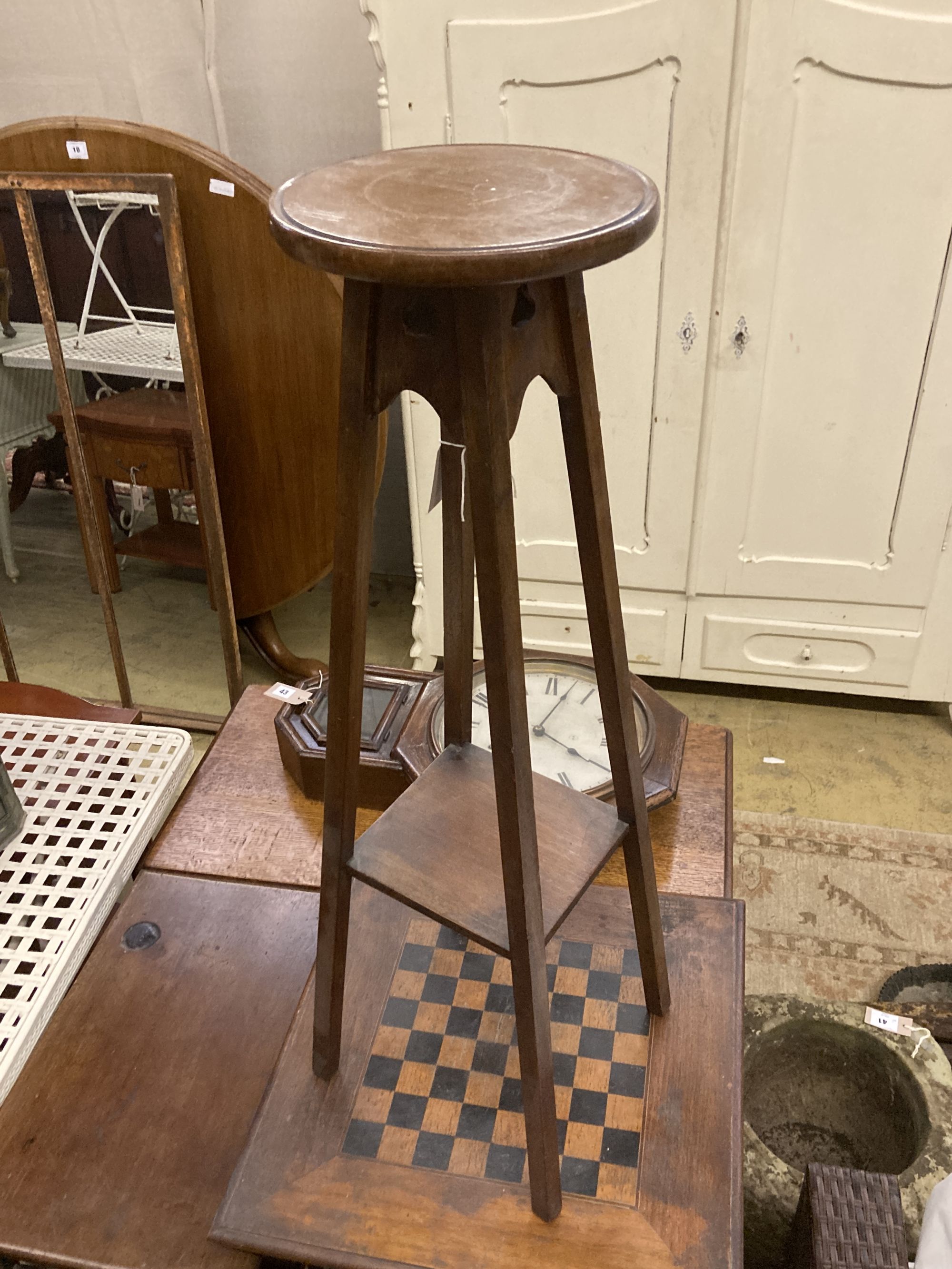 A Victorian two tier games table, width 50cm, depth 50cm, height 79cm together with an aesthetic movement side table and a plant stand